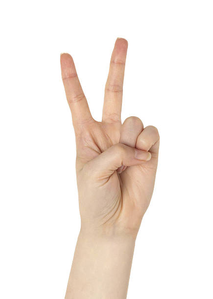 istock Hand with two fingers up in the peace or victory 519486397