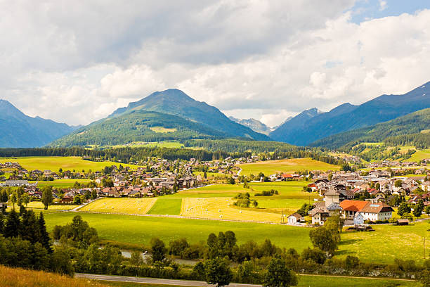 istock Alpine village and meadows 519486945