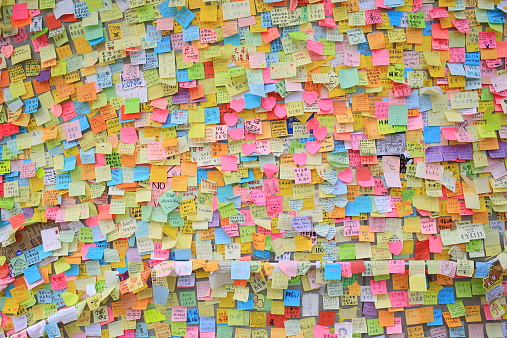 Hong Kong, Сhina - October 12, 2014: people post the memo on the wall of admiralty government offices in Admiralty. Umbrella revolution after two week, people still insist in ocuupy protest.