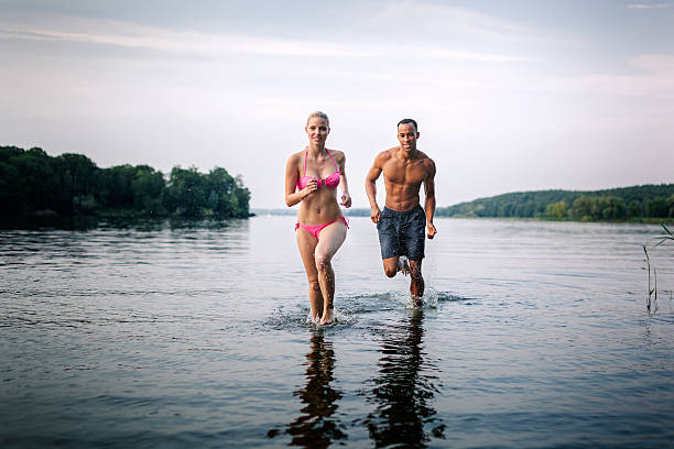 istock Playful Couple at a Lake 519489639