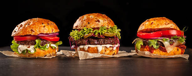 istock Fresh home-made hamburgers served on stone 519490662