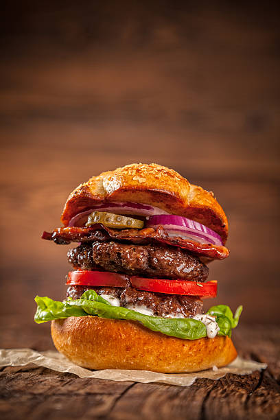 istock Fresh home-made hamburger served on wood 519490688