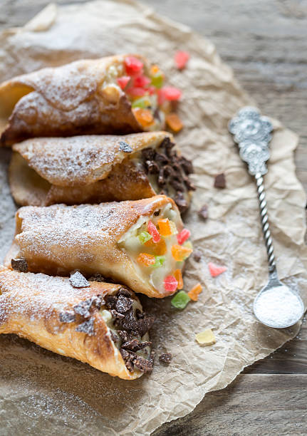 istock Cannoli stuffed with cream cheese 519491346