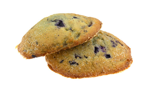 istock Freshly baked blueberry muffin tops on a white background 519491708