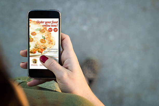Woman walking smartphone with order food online interface