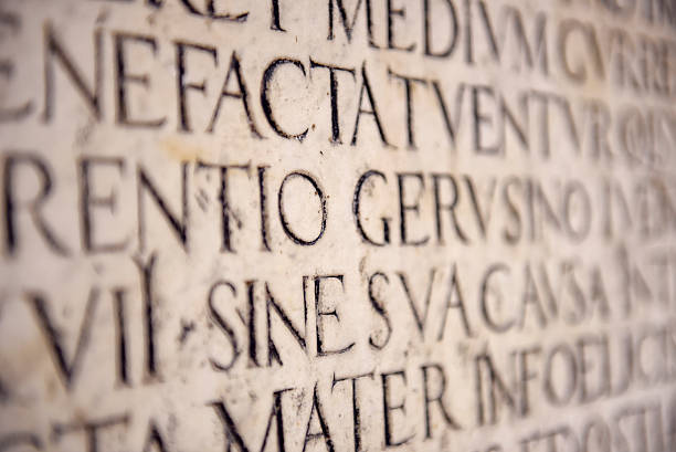 Ancient Latin Inscription Ancient Latin Inscription latin script stock pictures, royalty-free photos & images