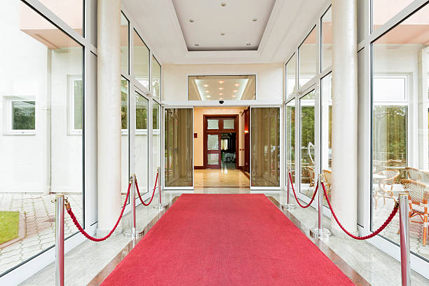 istock Elegant luxury hotel entrance with red carpet 519493334