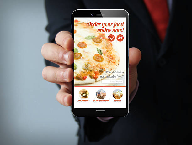 istock ordering pizza businessman smartphone 519494120