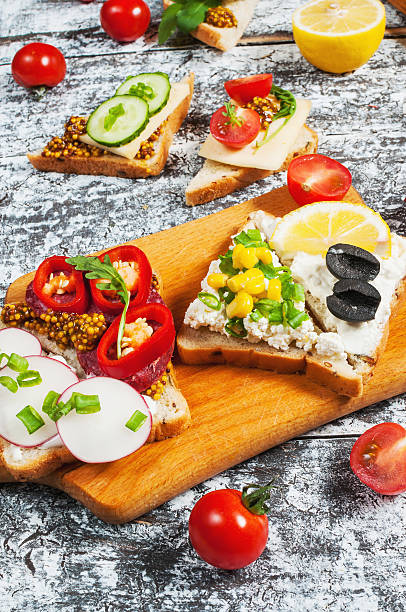 istock Variety of open sandwiches with different toppings 519494412