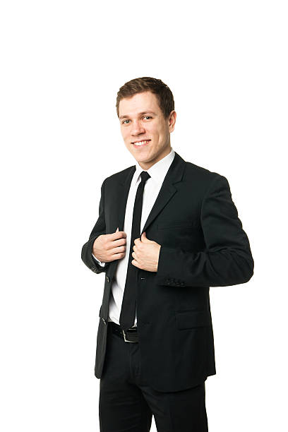 istock Friendly businessman looking at camera isolated 519494856