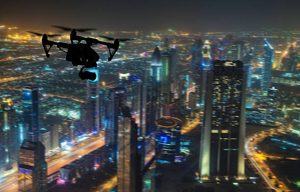 istock Drone silhouette flying above Dubaicity panorama 519496732
