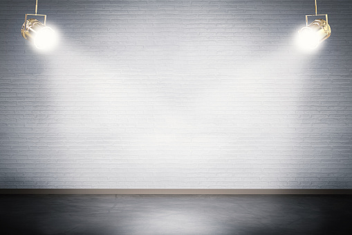 blank stage with shining spotlight