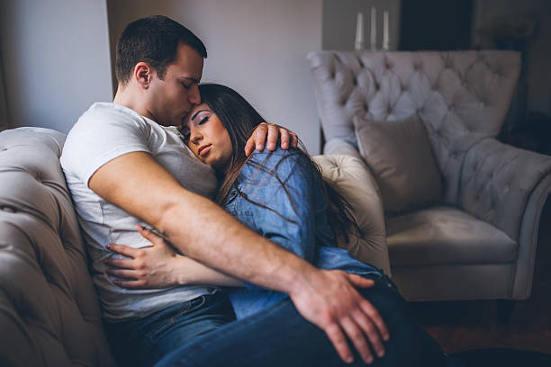 istock Affectionate couple enjoying by the window with eyes closed 519498504