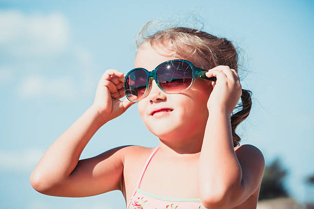 istock little girl with sunglasses 519500030