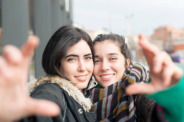 istock Two woman friend selfie gesture. 519501182