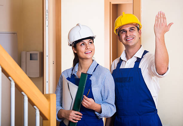 istock Professional maintenance crew of two specialists indoors 519501190