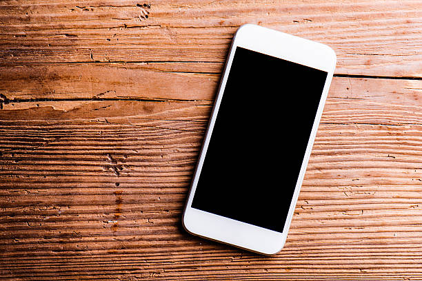 Iphone Desk Изображения: просматривайте стоковые фотографии, векторные изображен