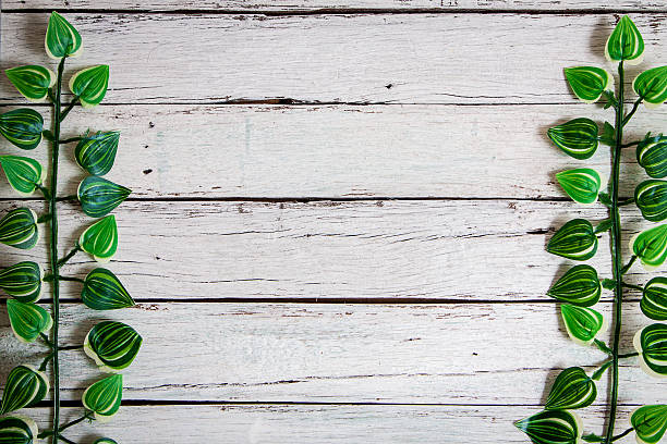 istock flowers on wooden background 519503148
