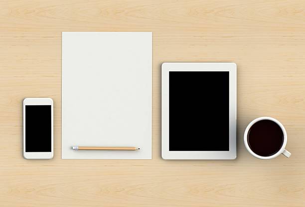 istock Blank paper with pencil, smart phone and coffee cup 519505266