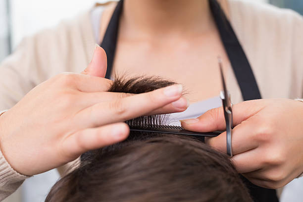 istock Man getting his hair trimmed 519508077