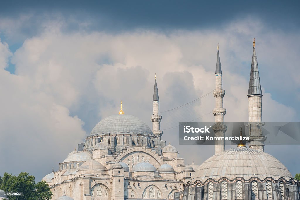 Süleymaniye Mosque against a stromy and cloudy backdrop The Süleymaniye Mosque in central Istanbul set against a stormy and cloudy sky. Architectural Dome Stock Photo