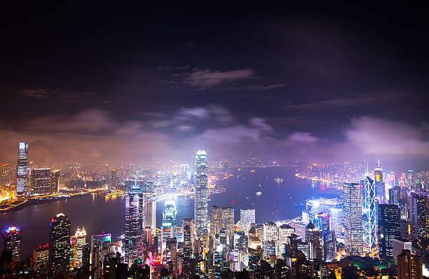 Hong Kong skyline at night Night view of Hong Kong skyline and the victoria harbor. the bank of china tower stock pictures, royalty-free photos & images