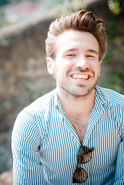 istock young handsome hipster modern man outdoor 519512003