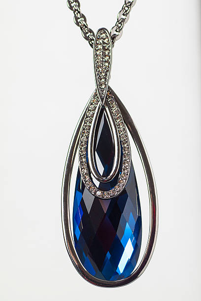 istock Silver pendant isolated on the white background 519523444