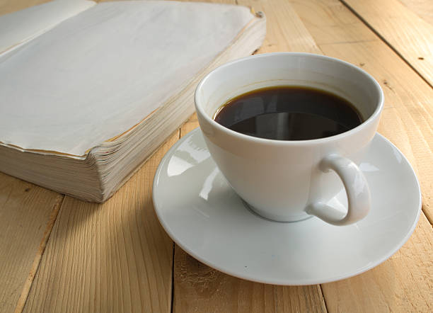 istock cup of coffee morning with book 519524464