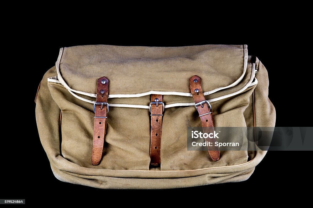 Old Canvas Game And Fishing Bag Isolated On Black Stock Photo