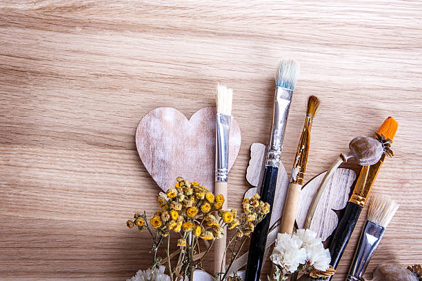 istock wooden brush flowers 519526334