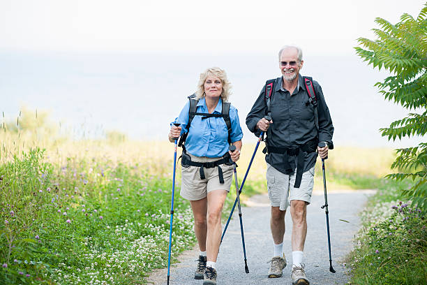 istock Walking with Hiking Poles 519526356
