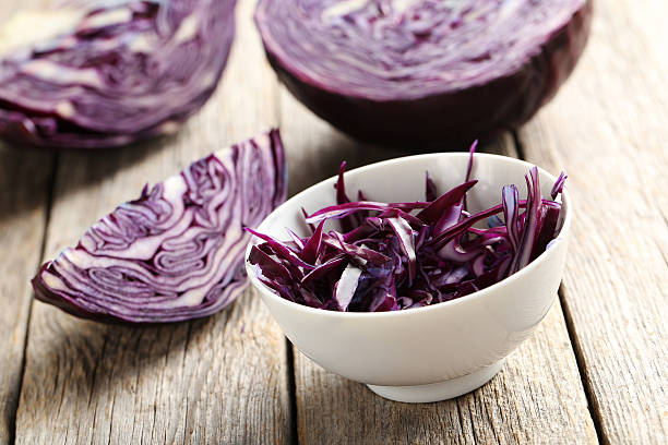 istock Ripe red cabbage on a grey wooden table 519526518