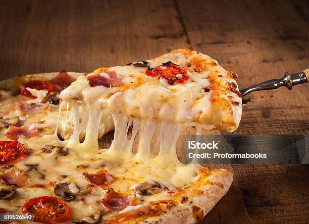 Slice Of Hot Pizza Stock Photo - Download Image Now - Pizza, Cheese, Melting