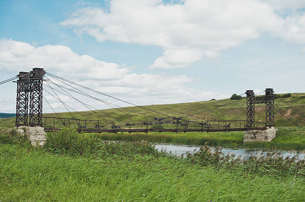 istock The old ruined bridge over the river 519526564