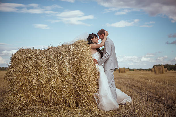 istock Married Couple in forest embracing 519529932
