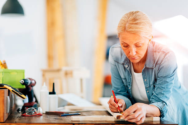istock Female Carpenter At Work In Her Office. 519530120