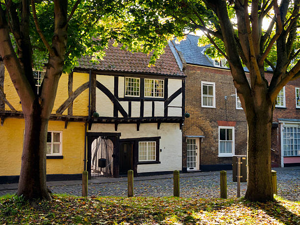 Old houses in King's Lynn Old terraced houses and former shops in Pilot Street, an historic area of the port of King’s Lynn in Norfolk, eastern England.  kings lynn stock pictures, royalty-free photos & images