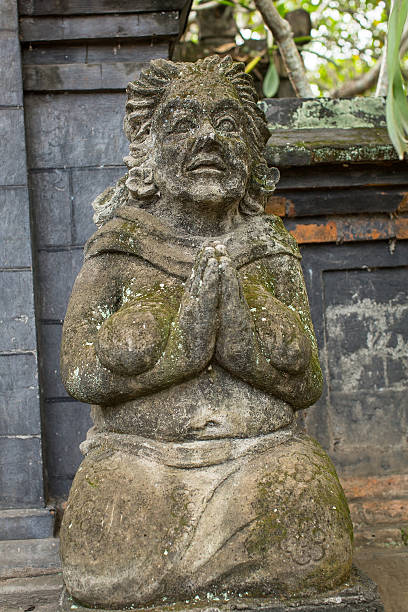 istock Traditional guard statue carved in stone on Bali island. 519533632