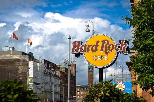 Copenhagen, Denmark - June 17, 2012: Sign of Hard Rock Cafe in Copenhagen, Denmark. Hard Rock Cafe is a famous restaurant chain notable for its collection of unique music memorabilia.