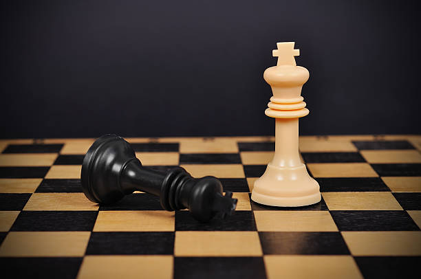 istock defeated black king of chess 519536145