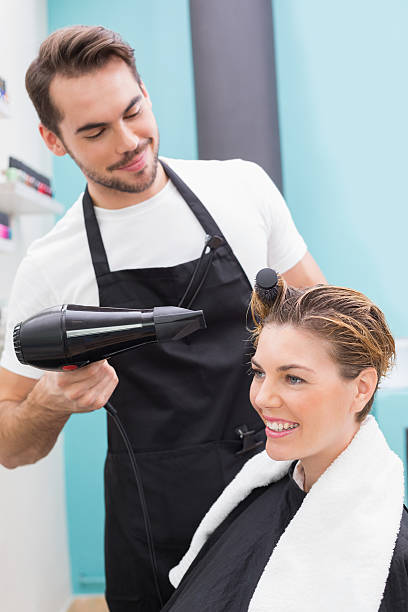 istock Woman getting her hair dried 519536441