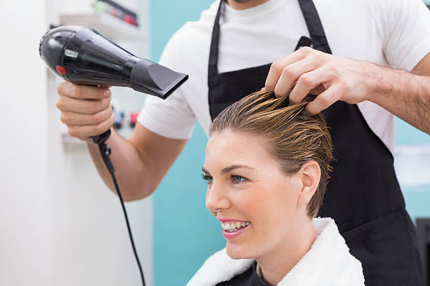 istock Woman getting her hair dried 519536445