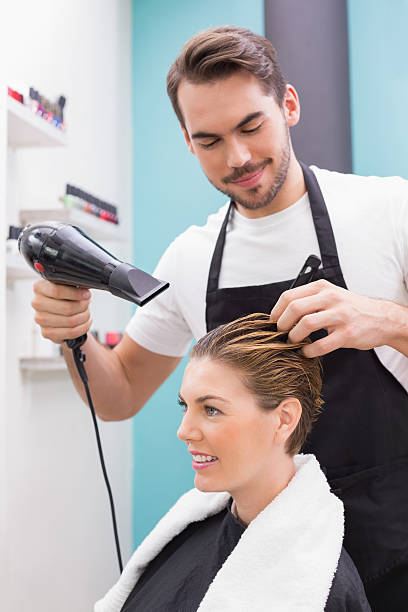 istock Woman getting her hair dried 519536447