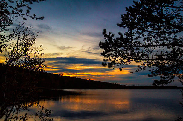 istock Colorful sunset over the calm lake 519544841