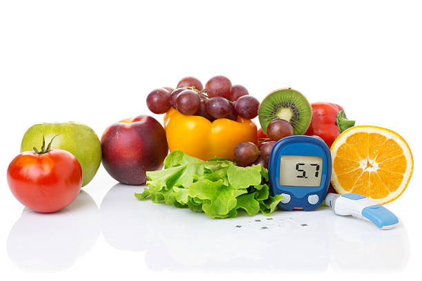 istock glucometer for glucose level and healthy organic food 519546658
