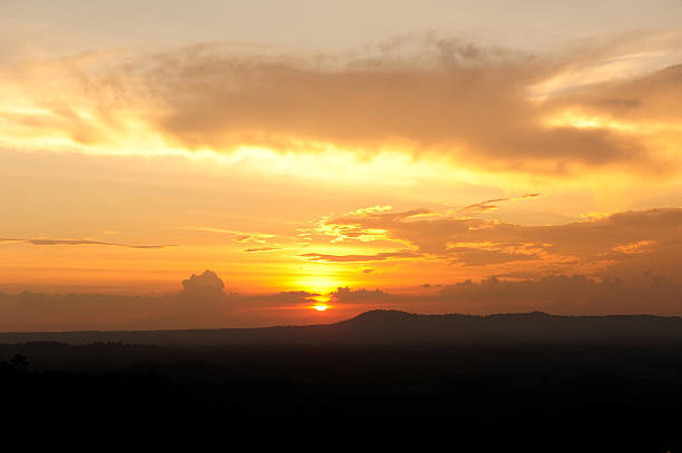 istock sunset over the mountain hills 519547795