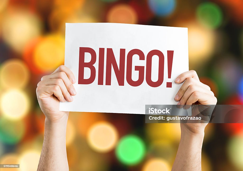 Bingo! placard with bokeh background Bingo Stock Photo