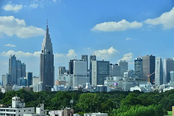 Tokyo skyline of Shinjuku area, one of sub-centers of Tokyo, under blue sky.