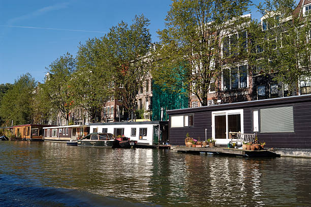 istock Houses by Amsterdam Canal 519549529